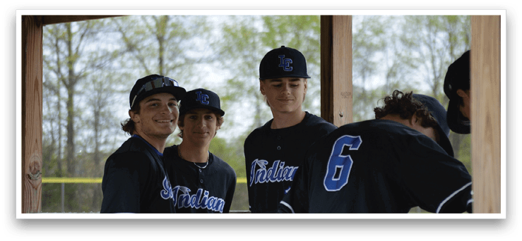 A group of young men wearing baseball caps and jerseys. Description generated by AI