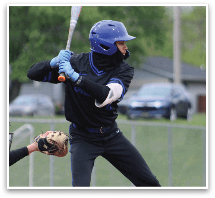 A baseball player is swinging a bat. Description generated by AI