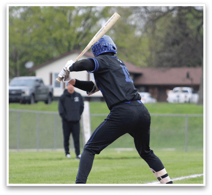A baseball player is swinging a bat. Description generated by AI