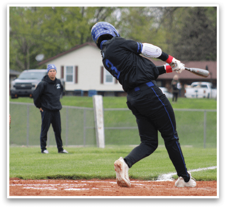 A baseball player is swinging a bat. Description generated by AI