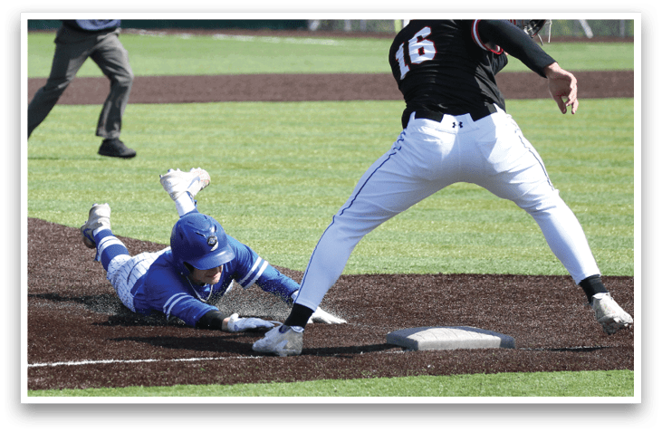 A baseball player slides into home plate. Description generated by AI
