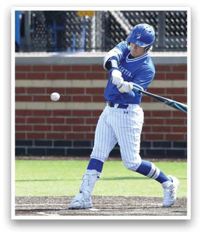 A baseball player in a blue and white uniform is swinging a bat at a ball. Description generated by AI