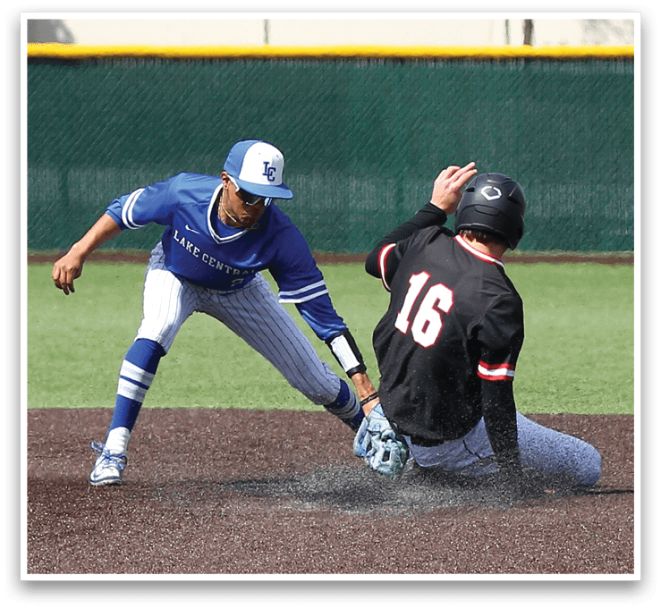 A baseball player slides into a base. Description generated by AI