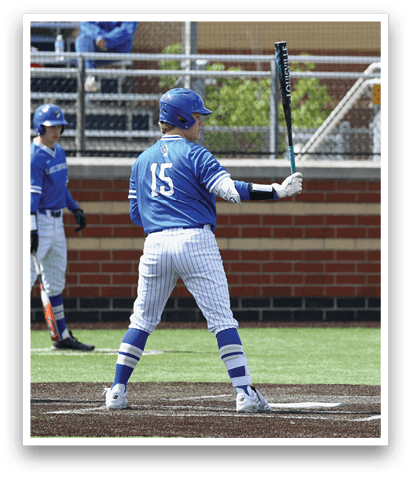A baseball player is swinging a bat at a ball. Description generated by AI
