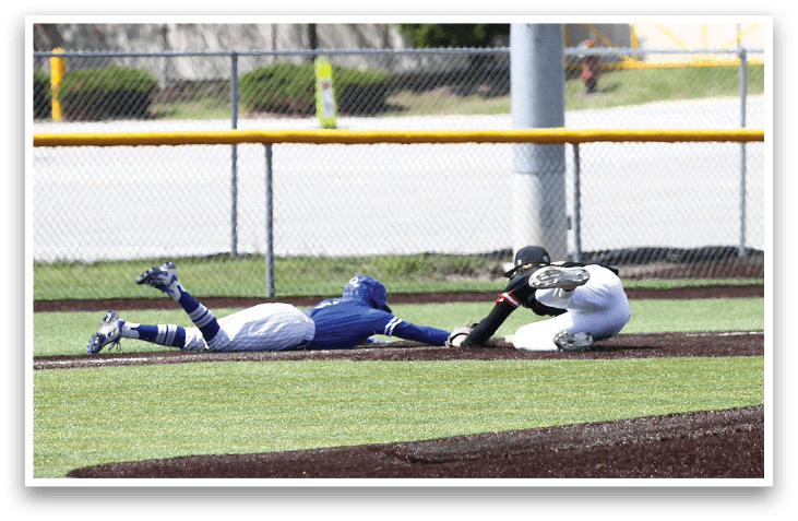 A baseball player slides into a base. Description generated by AI