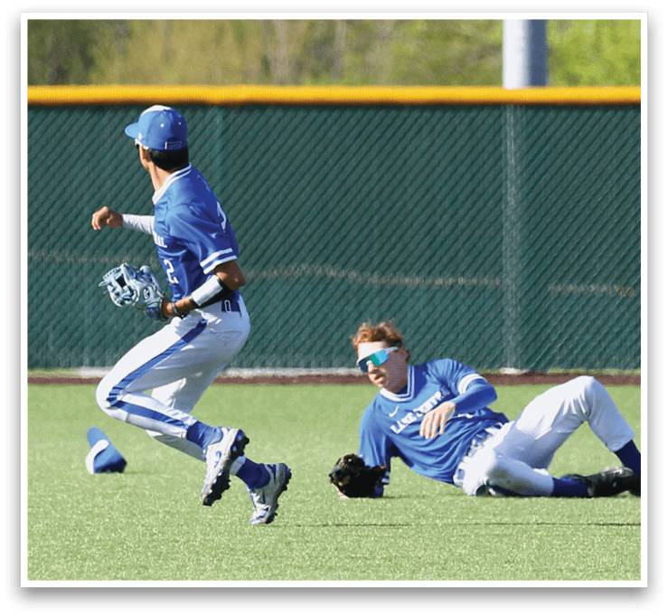 A baseball player slides into a base. Description generated by AI