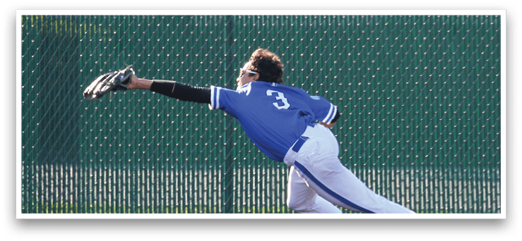 A baseball player is diving for a ball. Description generated by AI