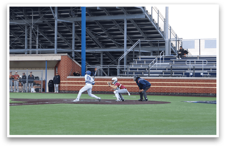 A baseball game is taking place in a stadium. Description generated by AI