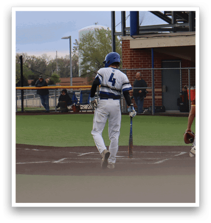 A baseball game is taking place with a batter, catcher, and umpire. Description generated by AI