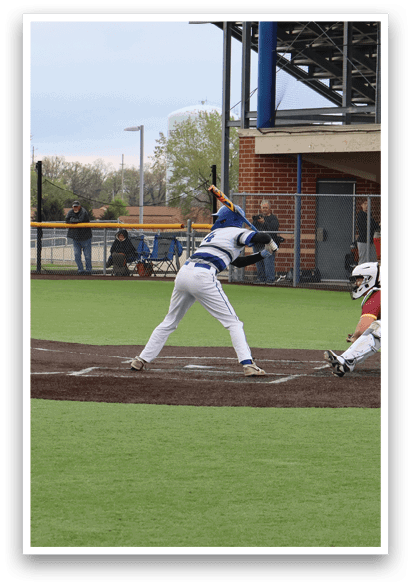 A baseball game is taking place on a field. Description generated by AI