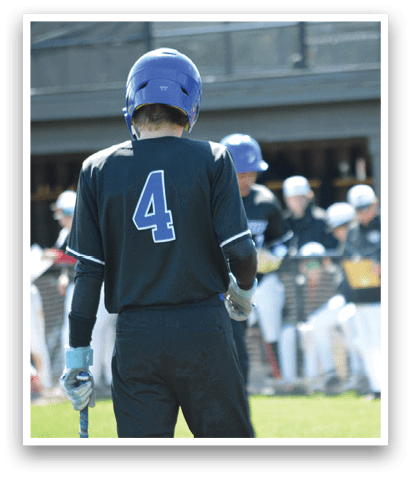 A baseball player wearing a blue helmet and black shirt. Description generated by AI