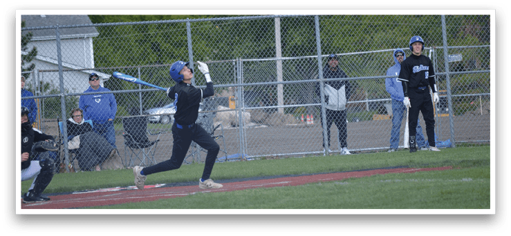 A baseball player is swinging a bat. Description generated by AI