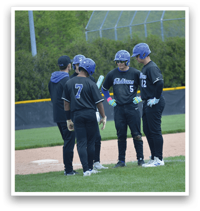 A group of baseball players wearing blue helmets and black uniforms. Description generated by AI
