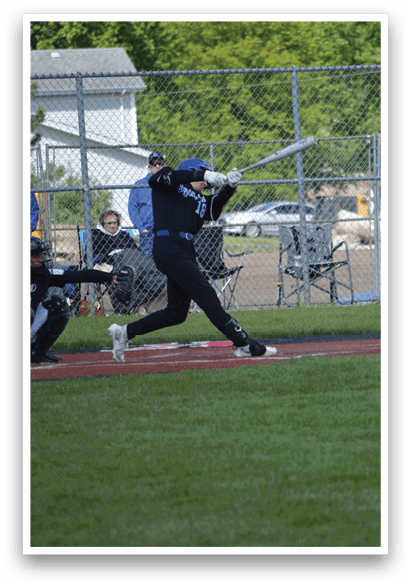 A baseball player is swinging a bat at a ball. Description generated by AI