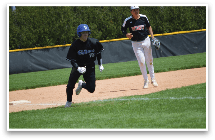 A baseball player running to a base. Description generated by AI