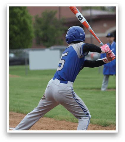 A baseball player in a blue and white uniform is swinging a bat. Description generated by AI