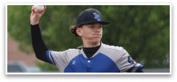 A baseball player in a blue and grey uniform is throwing a ball. Description generated by AI