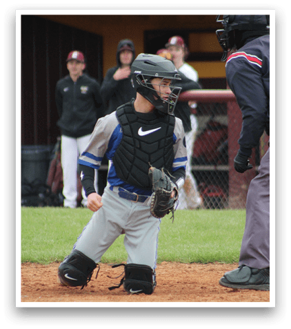 A baseball player wearing a blue and black uniform. Description generated by AI