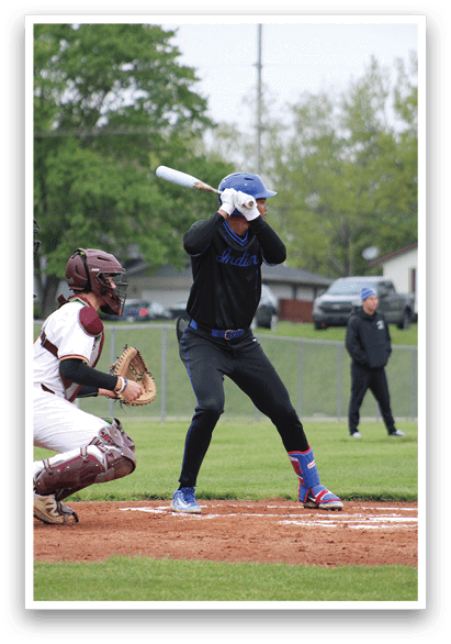 A baseball player is swinging a bat. Description generated by AI