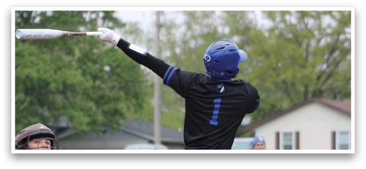 A baseball player is swinging a bat at a ball. Description generated by AI