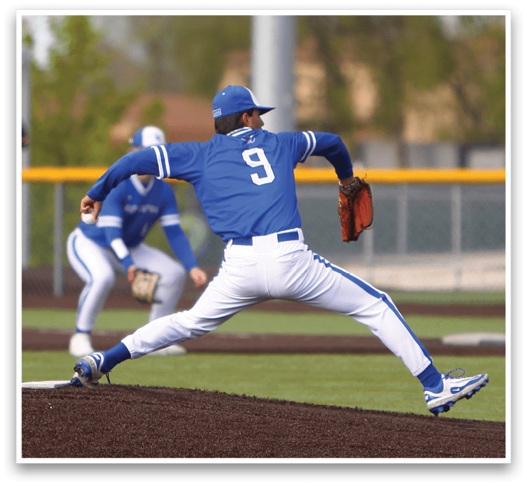 A baseball player wearing a blue shirt and white pants is throwing a ball. Description generated by AI