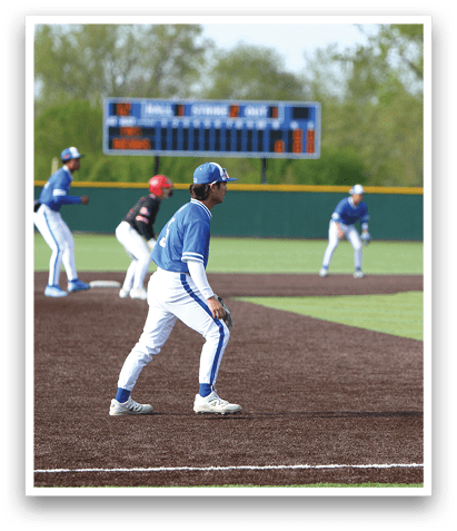 Baseball players on a field. Description generated by AI