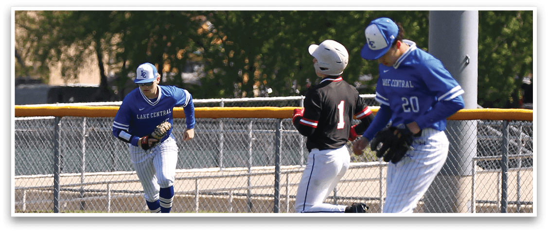 Three baseball players wearing blue and white uniforms. Description generated by AI