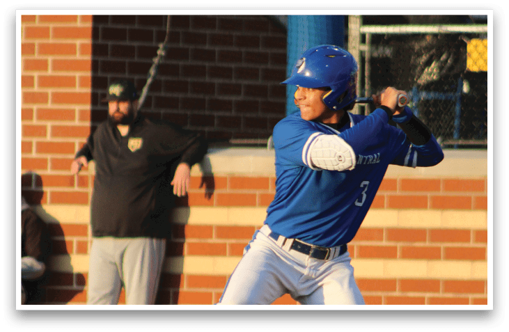A baseball player in a blue shirt and white pants is running towards a base. Description generated by AI