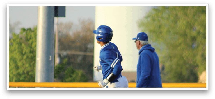 A baseball player wearing a blue helmet and blue and white uniform. Description generated by AI