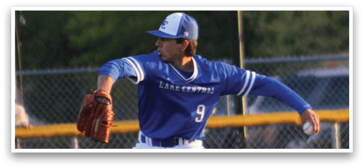 A baseball player in a blue shirt and white pants is throwing a ball. Description generated by AI