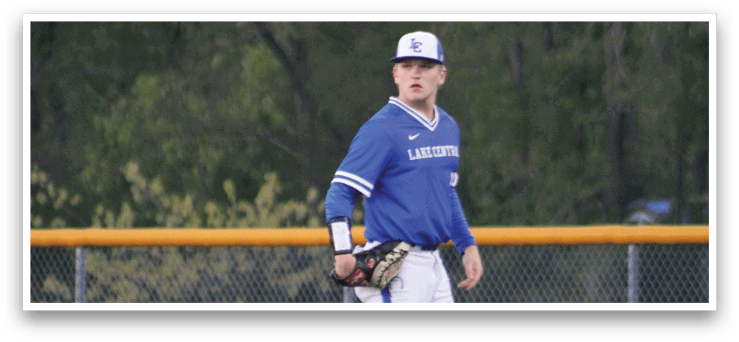A baseball player in a blue and white uniform is running towards the base. Description generated by AI