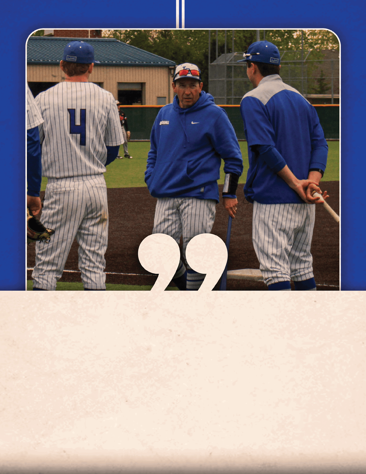 A baseball player wearing a blue and white uniform. Description generated by AI