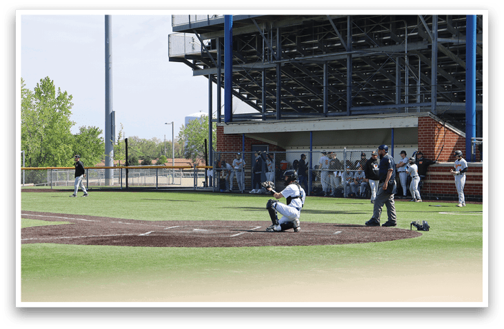 A baseball game is taking place with a batter at home plate. Description generated by AI