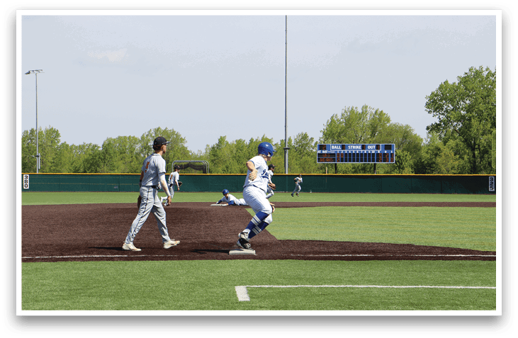A baseball player is running to first base. Description generated by AI