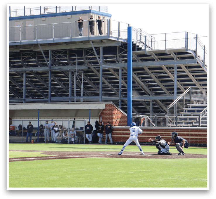 A baseball game is taking place on a field. Description generated by AI