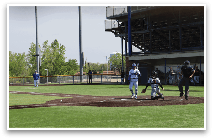 A baseball game is taking place with a batter, catcher, and umpire. Description generated by AI