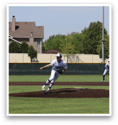 A baseball game is taking place on a field. Description generated by AI