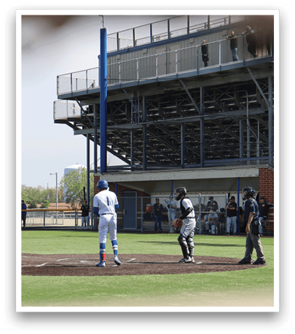 A baseball game is taking place in a stadium. Description generated by AI
