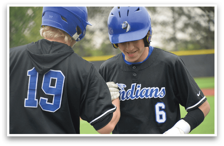 Two baseball players shaking hands. Description generated by AI