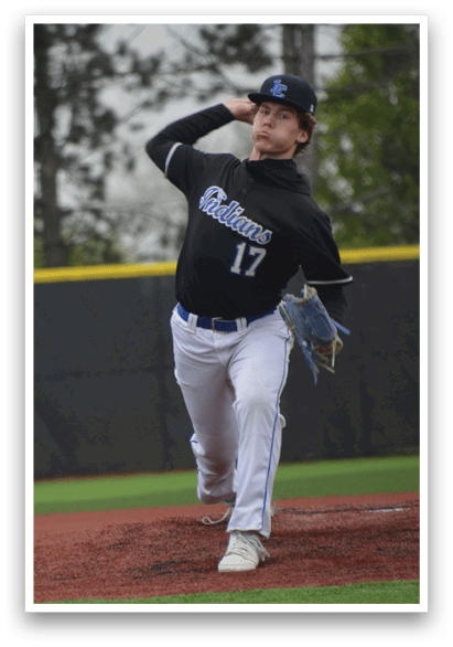 A baseball player in a black shirt and white pants is throwing a ball. Description generated by AI