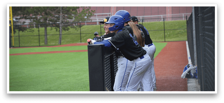 A baseball player wearing a blue helmet. Description generated by AI