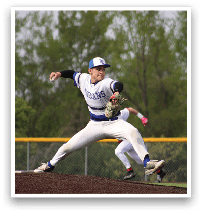 A baseball player slides into a base. Description generated by AI