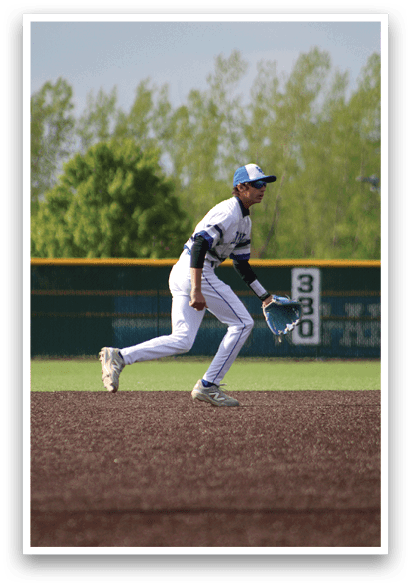 A baseball player is sliding into a base. Description generated by AI
