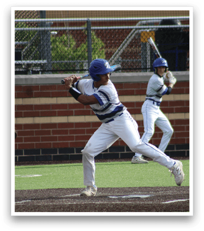 A baseball player in a blue helmet and white uniform is running to a base. Description generated by AI