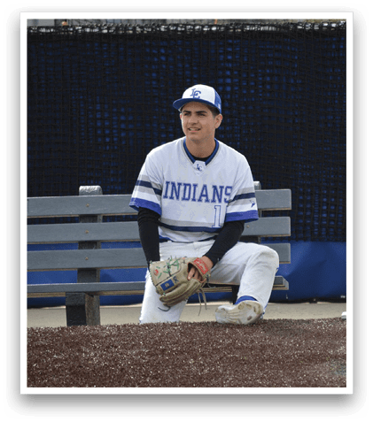 A baseball player sitting on a bench. Description generated by AI