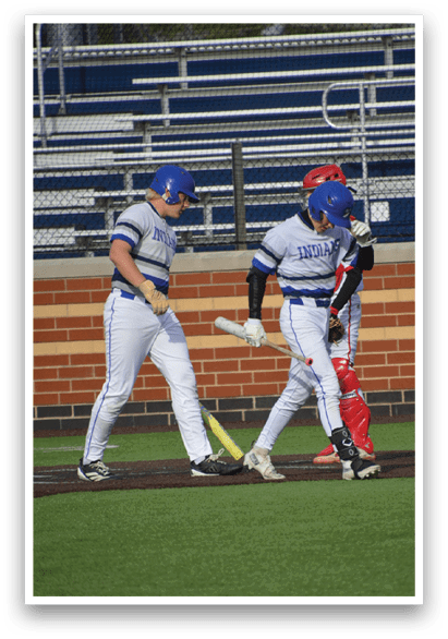 Two baseball players shaking hands. Description generated by AI