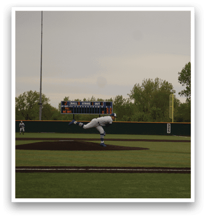 A baseball player is pitching a ball. Description generated by AI