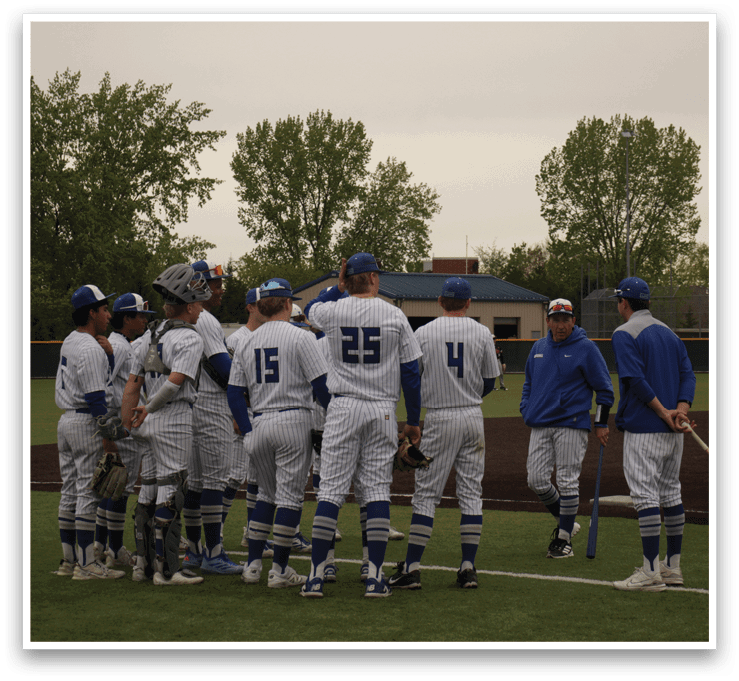 Baseball players on a field. Description generated by AI