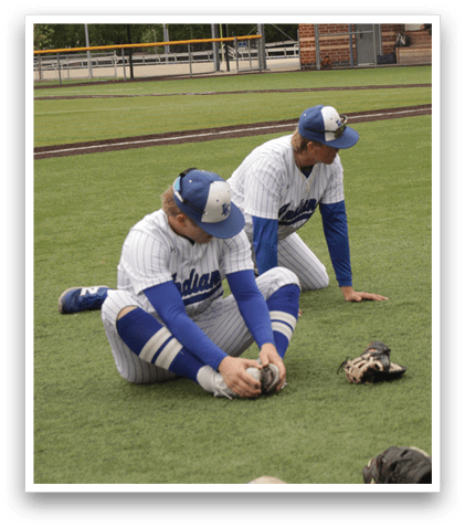 Two baseball players on the field. Description generated by AI