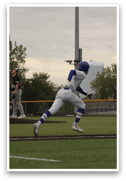 A baseball player running on the field. Description generated by AI